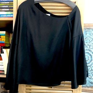 Classic blouse slightly off one shoulder/